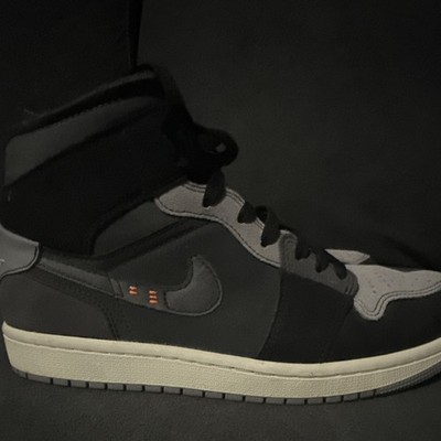 Air Jordan 1 Mid SE Craft Black and Cement Grey Little bit of tear