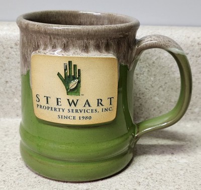 DENEEN POTTERY USA STEWART PROPERTY SERVICES, INC SINCE 1980, 2021 COFFEE MUG