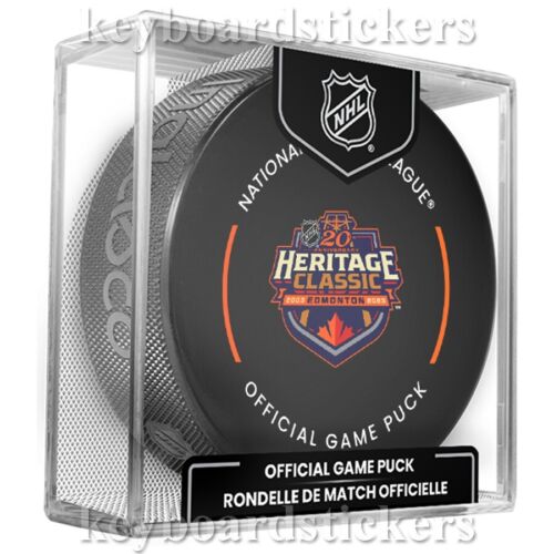 2023 NHL HERITAGE CLASSIQUE RONDELLE DE JEU OFFICIELLE CALGARY FLAMES vs EDMONTON OILERS - Photo 1/4