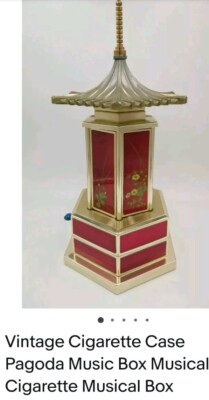 cigarette lipstick carousel Reuge Vintage Cigarette Lipstick Carousel Pagoda Music Box 1960's
