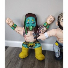 AEW all elite wrestling talking plush buddies Kenny Omega Luchasaurus
