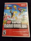 New ListingNew Super Mario Bros. Wii - Nintendo Wii - Complete CIB - Tested & Working