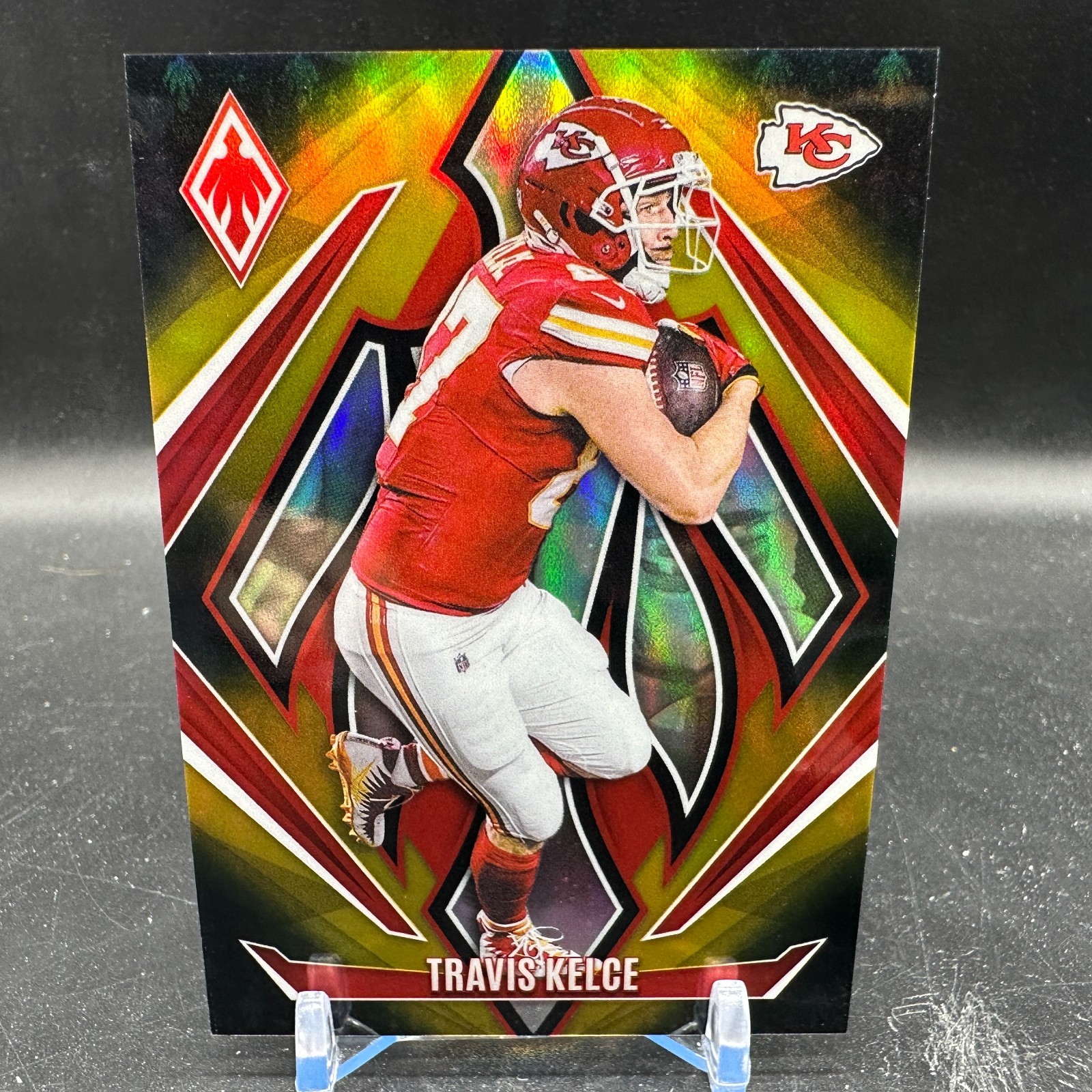 Travis Kelce Bronze Fade /125 2024 Panini Phoenix #134 Kansas City Chiefs