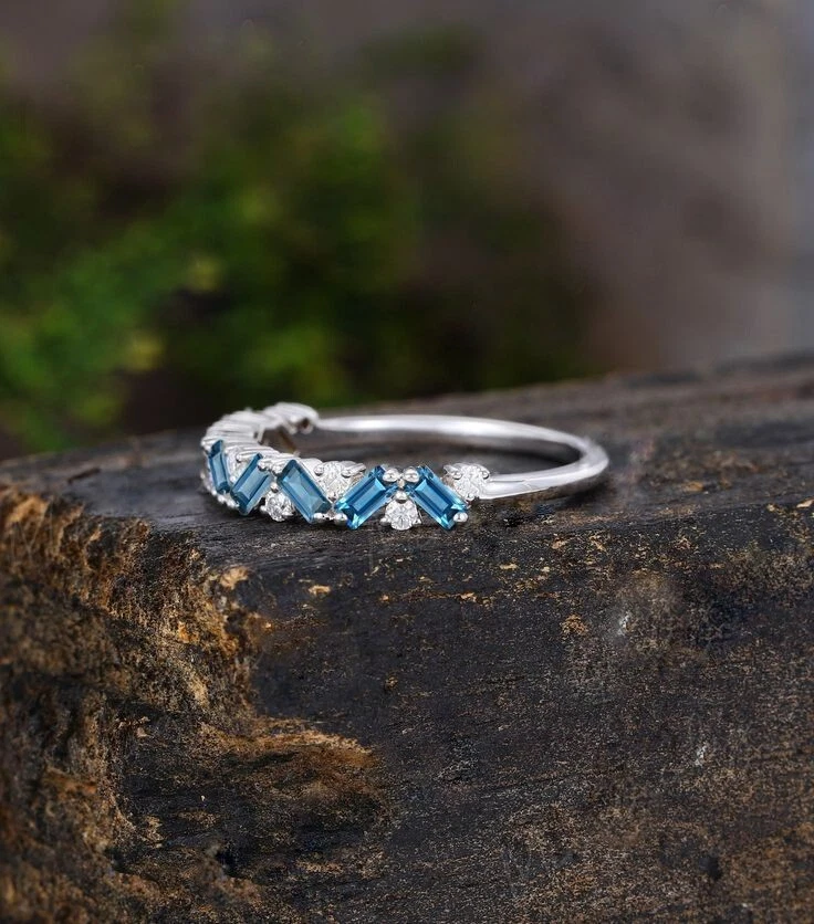 0.60TCW Simulated Blue Topaz & Moissanite In 10K White Gold Women Eternity Ring - Image 2 of 4
