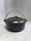 Vintage LODGE 10" D1 8DOl cast iron dutch oven w/ basting lid & handle, made USA