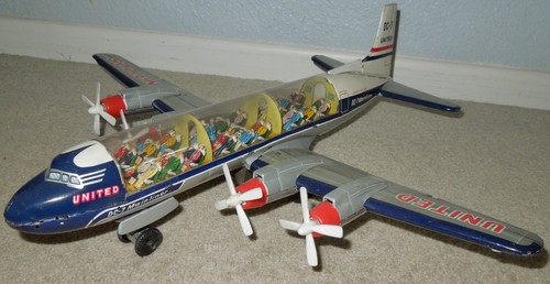 Vintage Nomura of Japan Blech Friction United Airlines DC-7C Mainliner mit sichtbarer Kabine