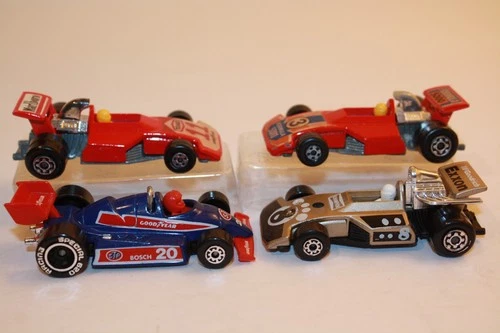 Four (4) 1975-1984 Vintage Matchbox Lesney Formula Race Cars EXXON / MARLBORO