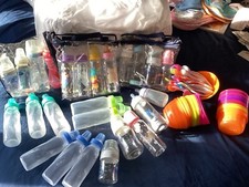 Assorted Plastic Baby Sitters Training Bottles, Spoons And Bowls