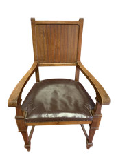 Antica poltrona da scrivania dei primi del 900 in noce seduta in cuoio