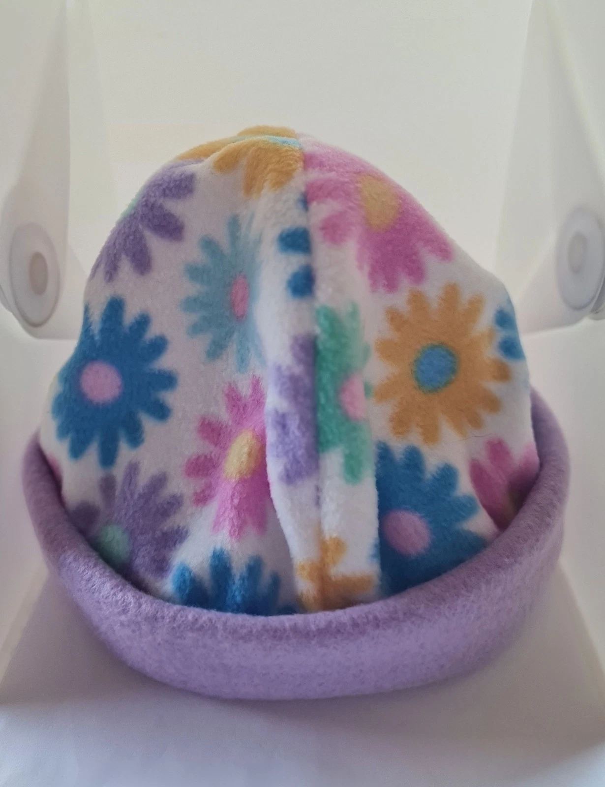 Women's flower print fleece beanie with purple trim size M