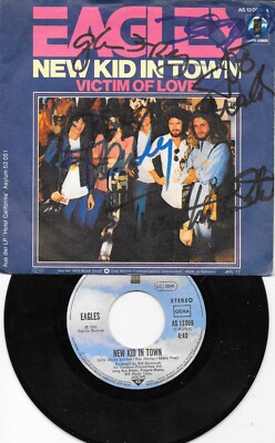 EAGLES - new kid in town  7''-Vinyl . SIGNED. AUTOGRAMM