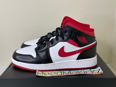 black and white jordans grade school