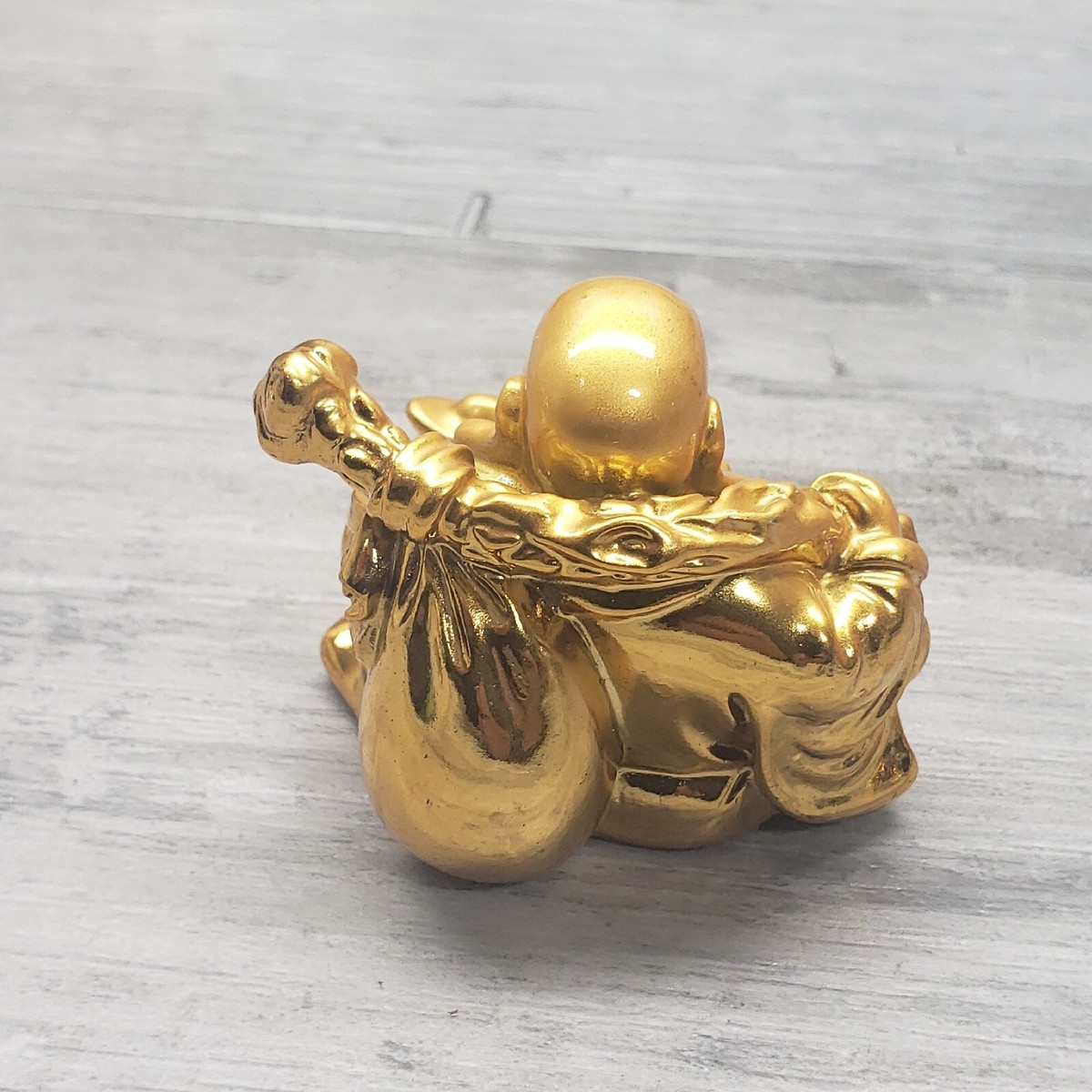 QIFU BUDDHA SHINY GOLD COLOR FIGURINE STATUE TRINKET with QIFU BUDDHA SHINY GOLD COLOR FIGURINE STATUE TRINKET with