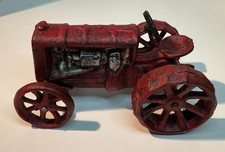 Vintage Cast iron toy tractor in red finish