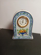 Haviland Limoges Porcelain Floral decorated with gold accents table clock.