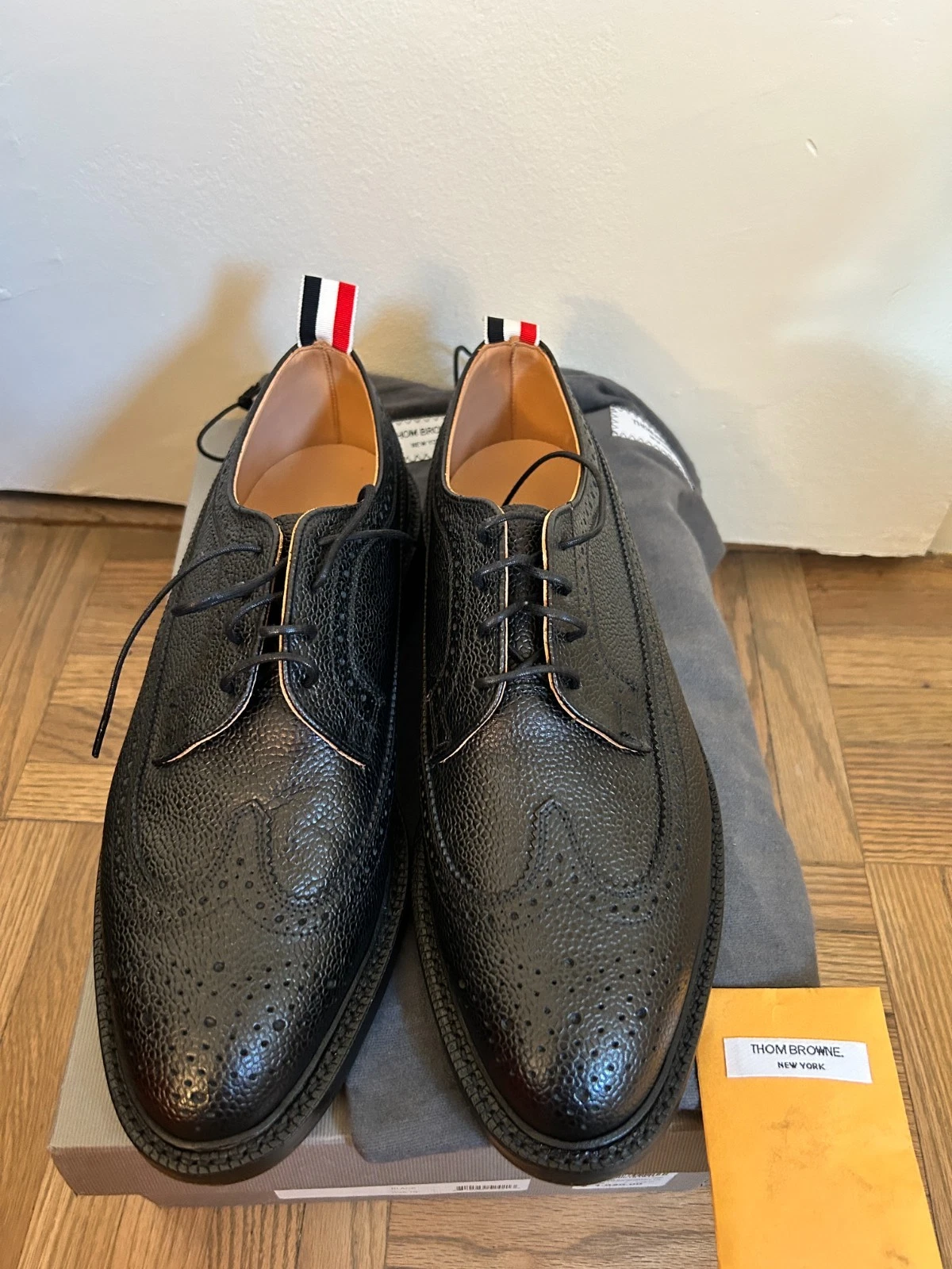 Thom Browne derby ad ali lunghe suola in pelle nera