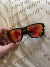 Oakley Holbrook sunglasses with orange/red reflective lenses