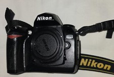 Nikon D70 - 6.1 MP - 3x Zoom - Digital SLR Camera  Battery - Black Body Only 
