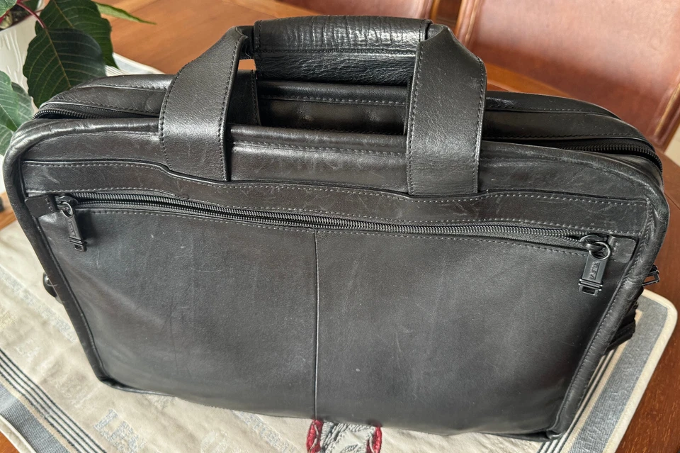 Sacoche d'affaires Tumi en cuir noir zippée pour ordinateur portable - Photo 1/4