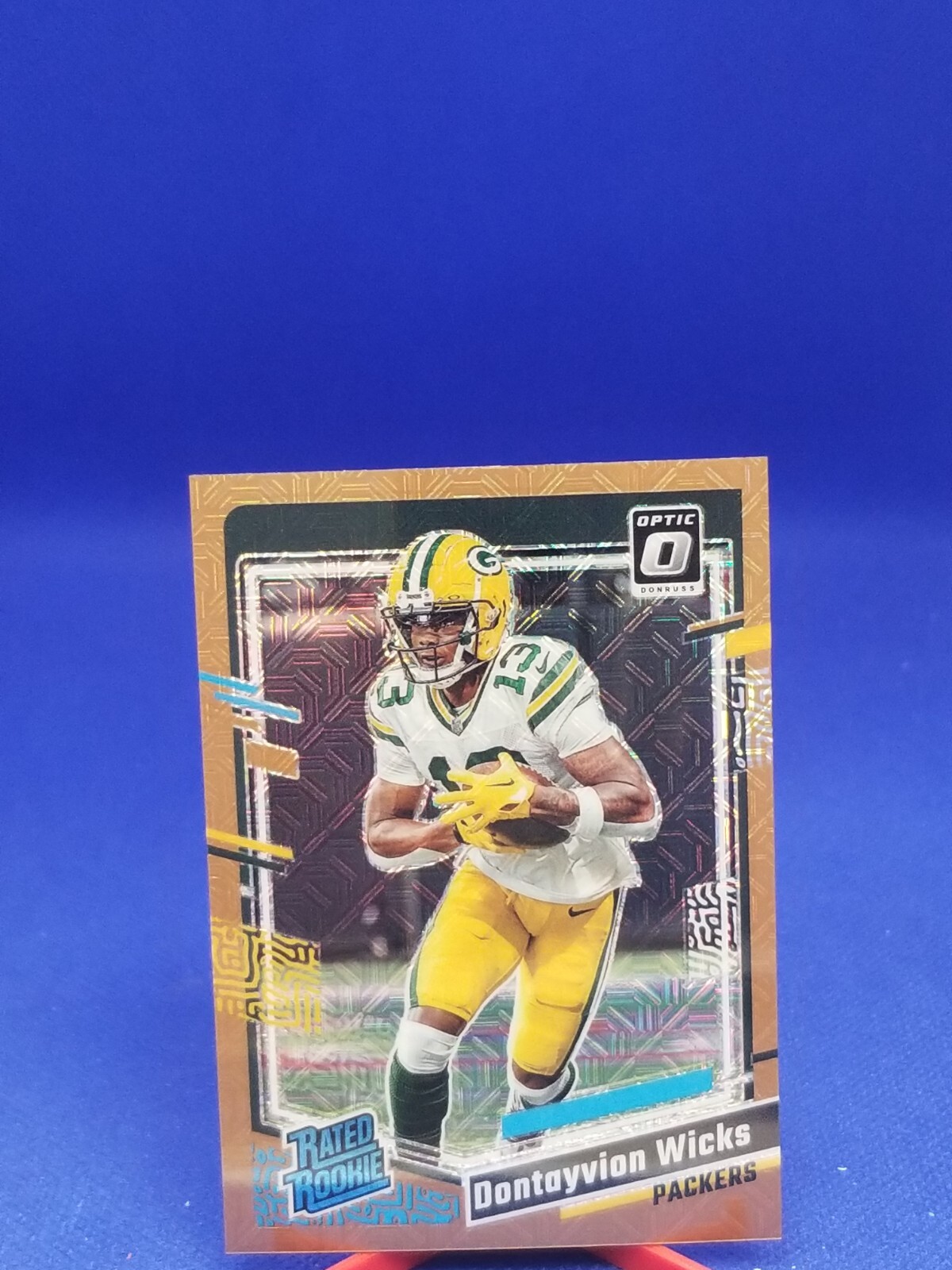 Dontayvion Wicks 2023 Optic Bronze Mojo RATED ROOKIE #249 1/35