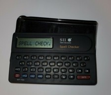 Seiko Instruments SII Spell Checker Pocket Size 80,000 Words With Sleeve 