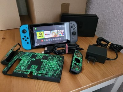 Nintendo Switch Konsole - 32GB - Spielkonsole - inkl. Schutz / Controllergrip