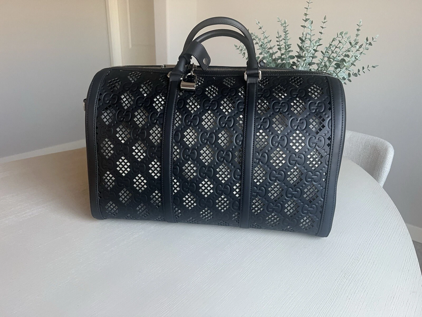 Sac de voyage 2 voies Gucci GG en relief