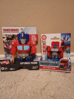 Transformers ''Bop It! Optimus Prime  Game And Earthspark Optimus Prime 