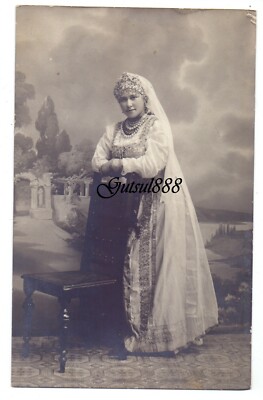 A beauty in Russian national costume Russian Empire. Vintage photo 1910