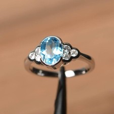 2.50Ct Oval Cut Lab-Created Blue Topaz Engagement Ring 14K White Gold Plated