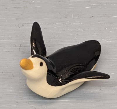Retired Hagen Renaker Penguin Sliding on Belly
