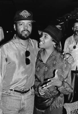 Rapper MC Lyte and First Priority Music President Nat Robinson ga - Old Photo