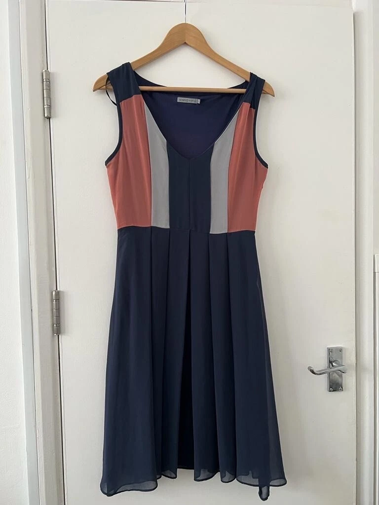 Navy blue and coral dress top