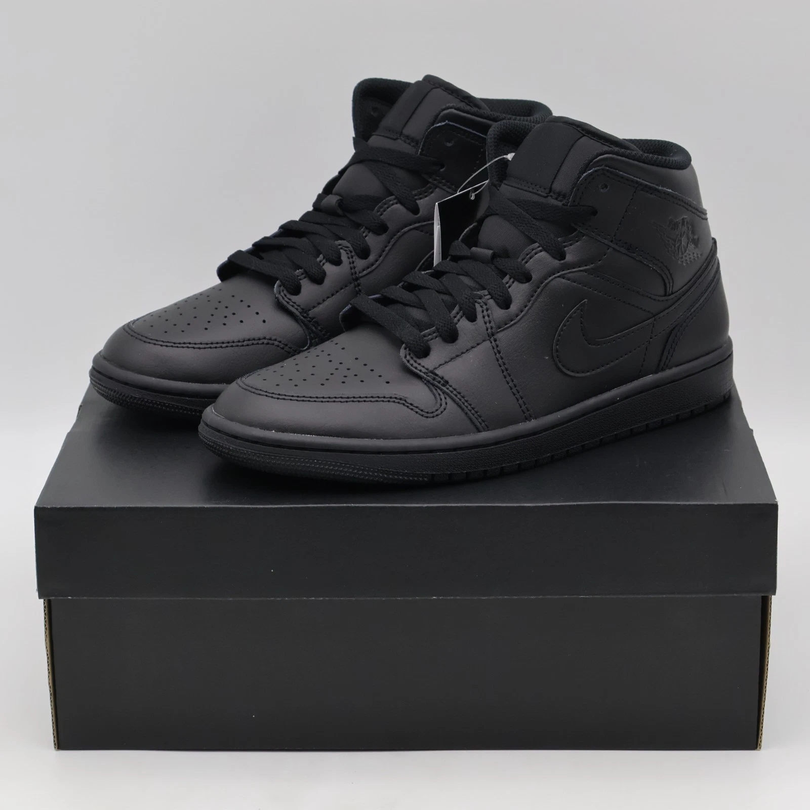 554724-093 Nike Air Jordan 1 Mid Triple Black (Men's)
