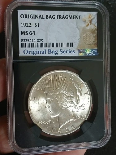 1922 Peace Silver Dollar W Original Bag Fragment NGC Ms 64 Black Core.