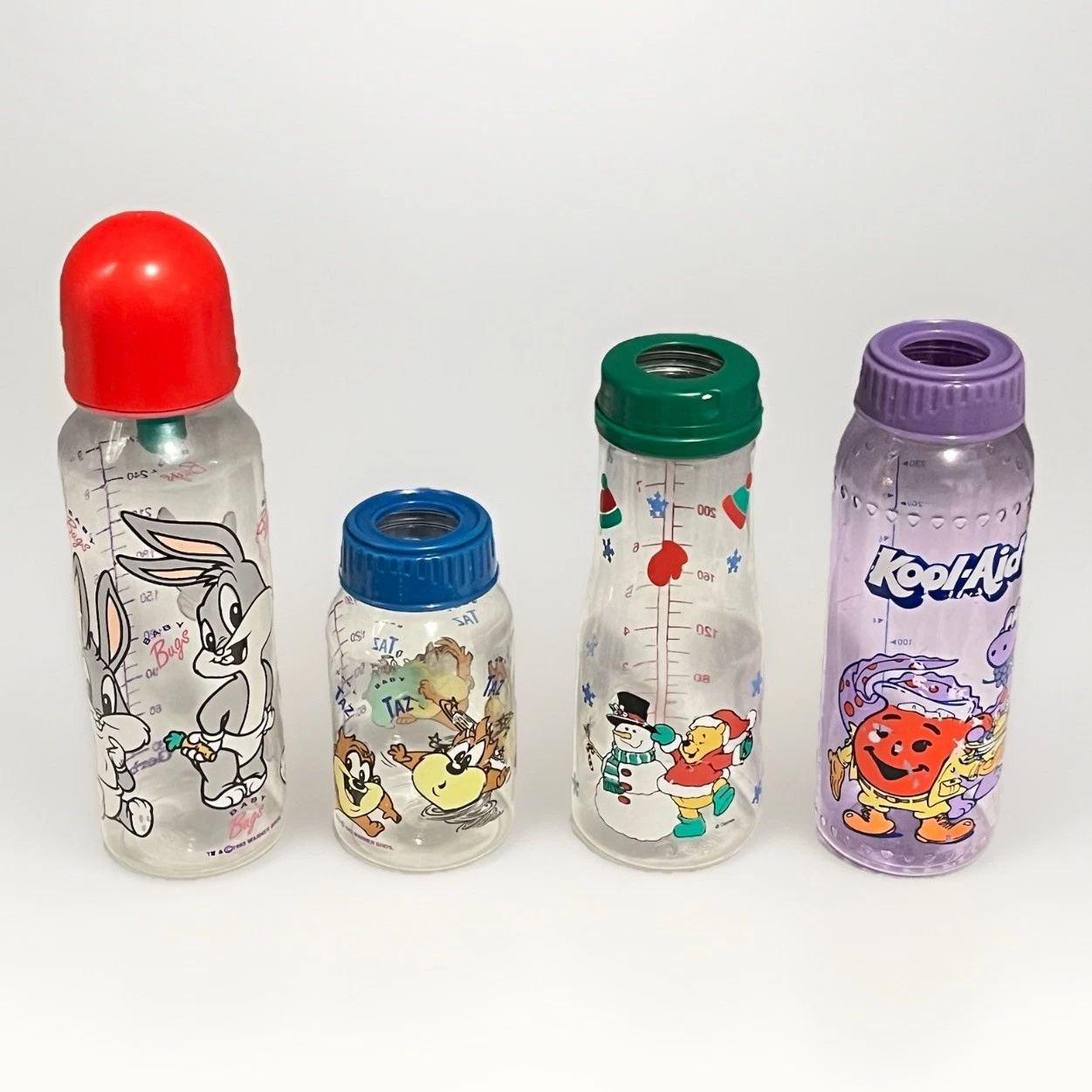 Vintage Baby Bottles Lot Looney Tunes Taz Kool-Aid Winnie The Pooh Bug Bunny 90s
Opens in a new wind