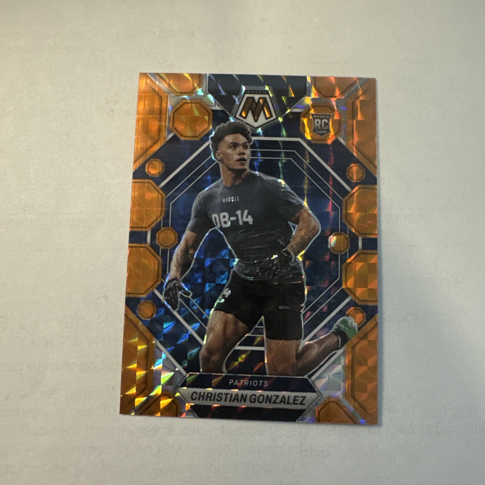 2023 Mosaic Football #300 Christian Gonzalez ORANGE Mosaic Rookie RC #116/199