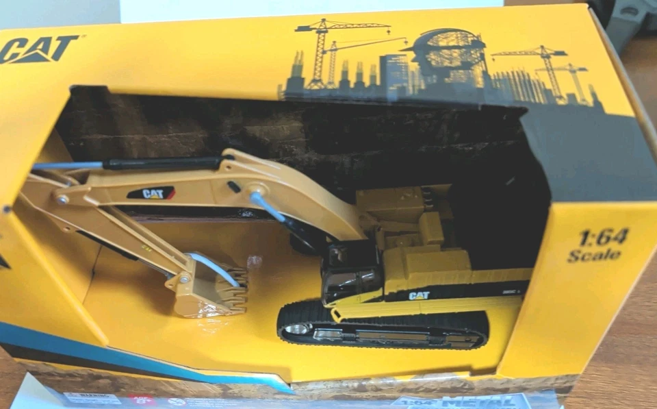 Excavadora hidráulica 1/64 Caterpillar CAT 385C L Diecast Masters 84651 Foto 3 de 4