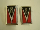NOS OEM Ford 1965 Mercury Comet V8 Fender Emblems Ornaments Trim Pair