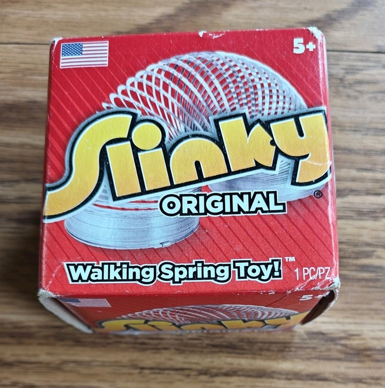 Original Metal Slinky Toy – walking spring toy. New old stock.Never opened.READ