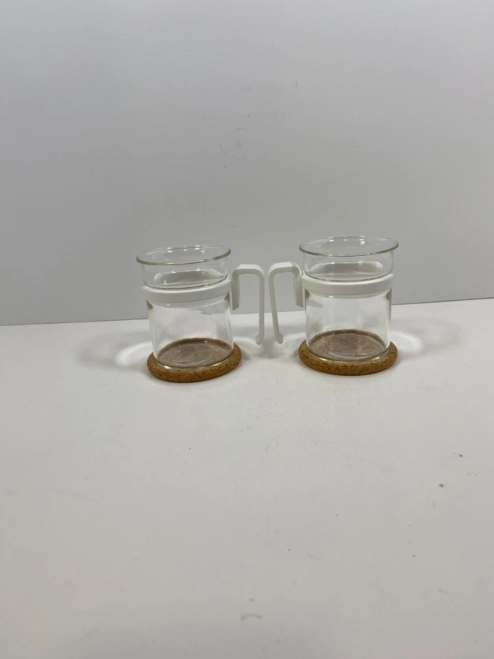 Juego de 2 tazas de té de vidrio transparente con asas blancas con posavasos de corcho Foto 2 de 4