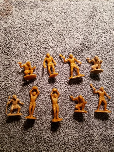 Marx Cavemenn Plastic Figures (9) 45mm 7 butterscotch, 2 tan