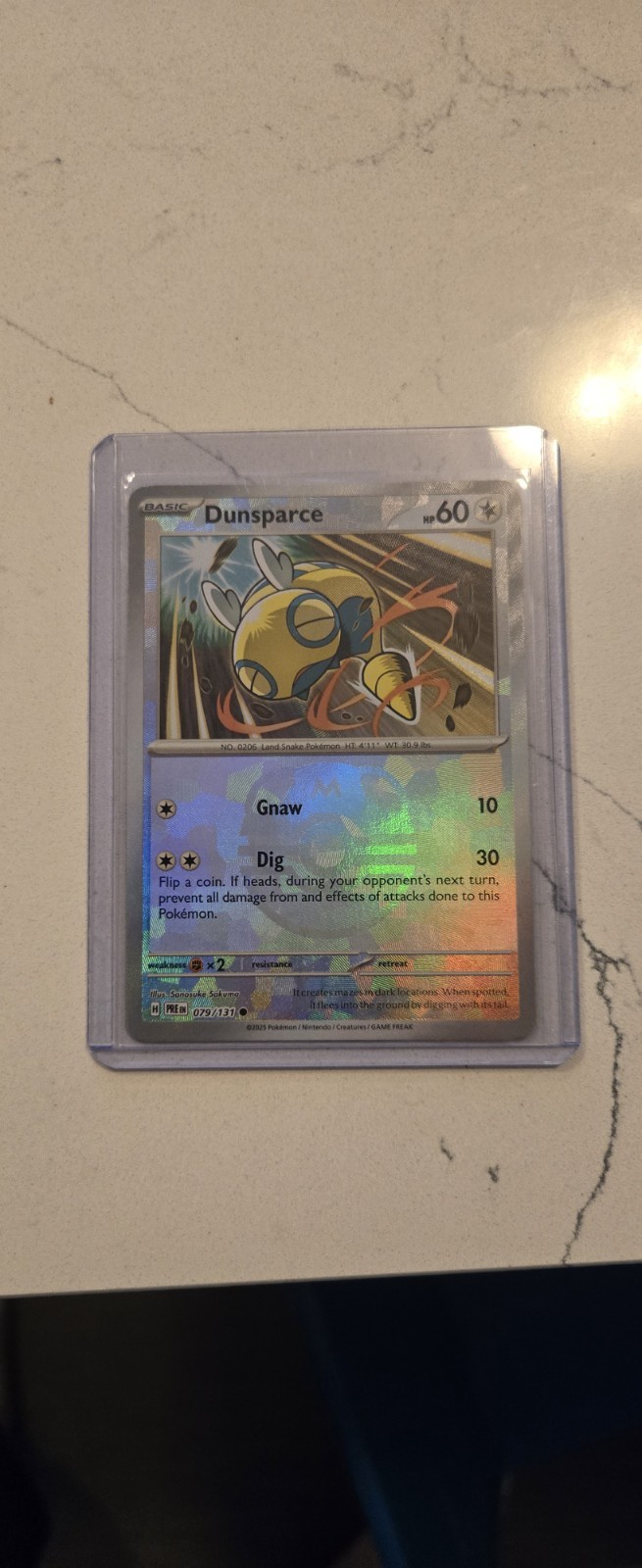 Pokemon TCG Dunsparce Masterball Reverse Holo Card 79/131 Prismatic Evolutions