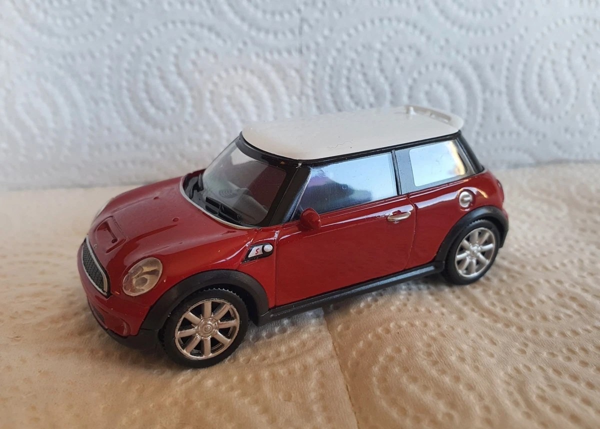 Miniature MINI COOPER 1300 rouge toit noir modèle à friction WELLY