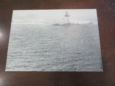 LIGHTHOUSE IN NANTUCKET MASS. IT REALLY SNOWED PHOTO BY EDA SCHANZER POST CARD