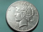 1928  PEACE DOLLAR  NICE  AU GRADE