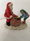 Noma Kringle town Collectibles - Elf with Santa Claus with box — photo 1