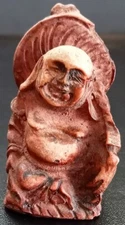 Hand carved stone Buddha