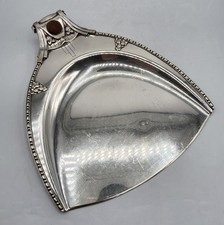 Ramasse miettes pelle en métal argenté et macassar décor géométrique Art Déco