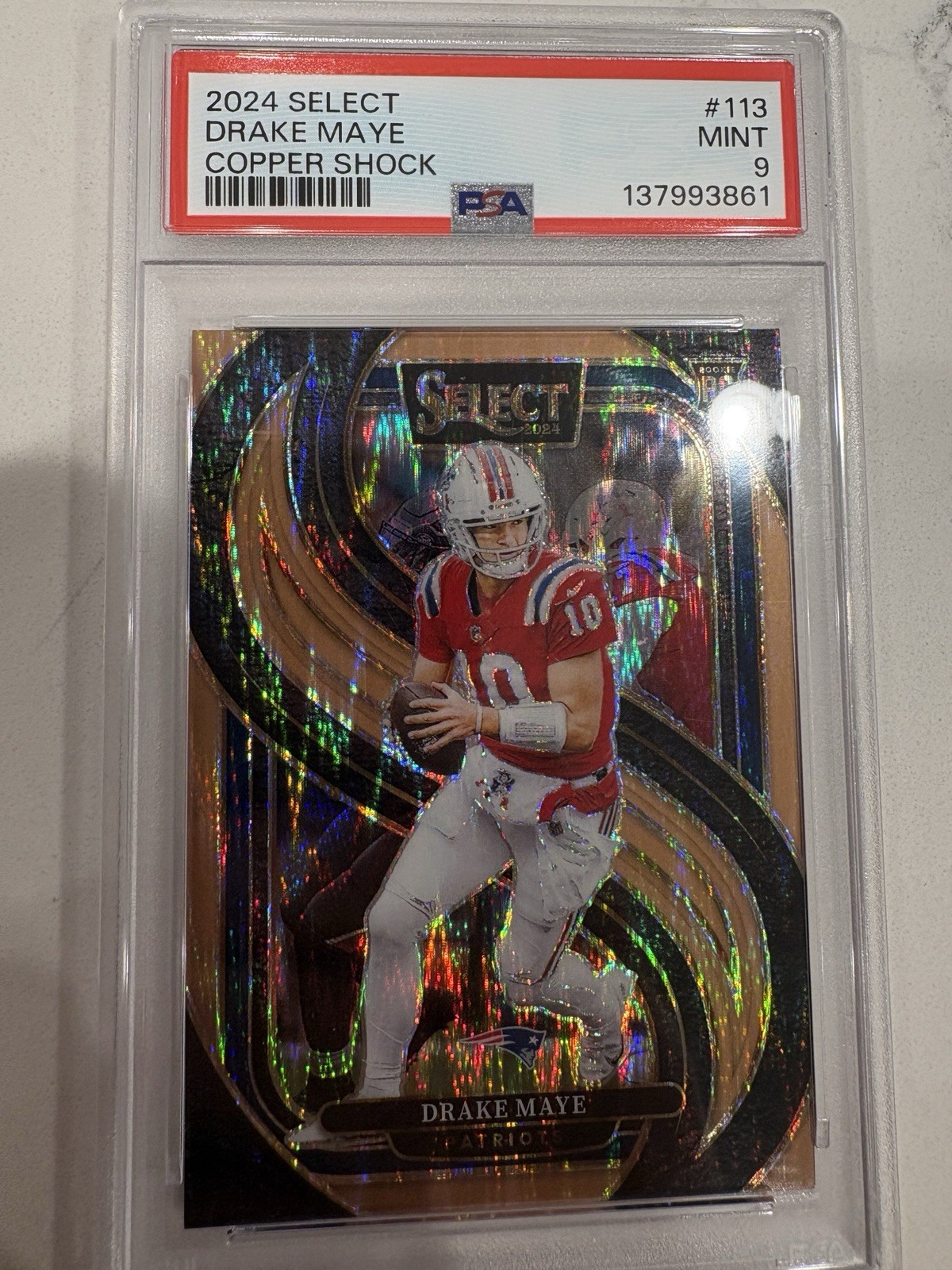 2024 Panini Select Premier Level Drake Maye #113 Copper Shock Prizm /299 (RC)